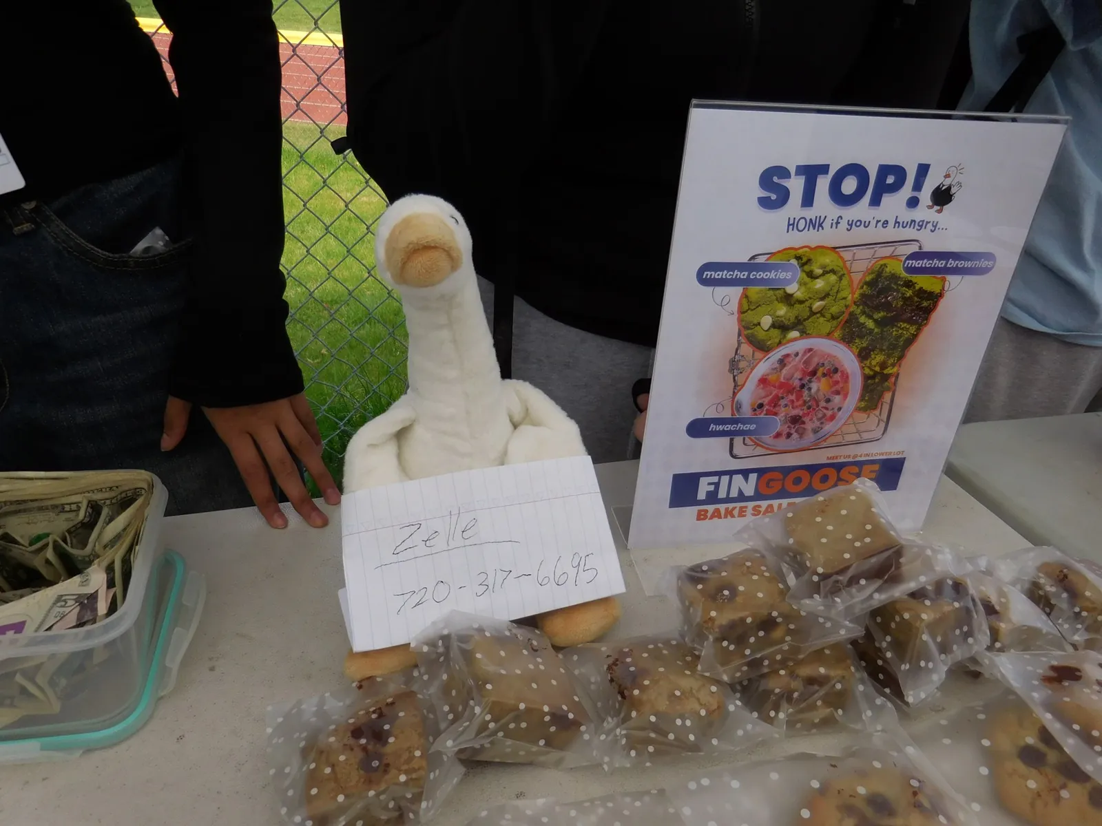 FinGoose plush and treats at the bake sale