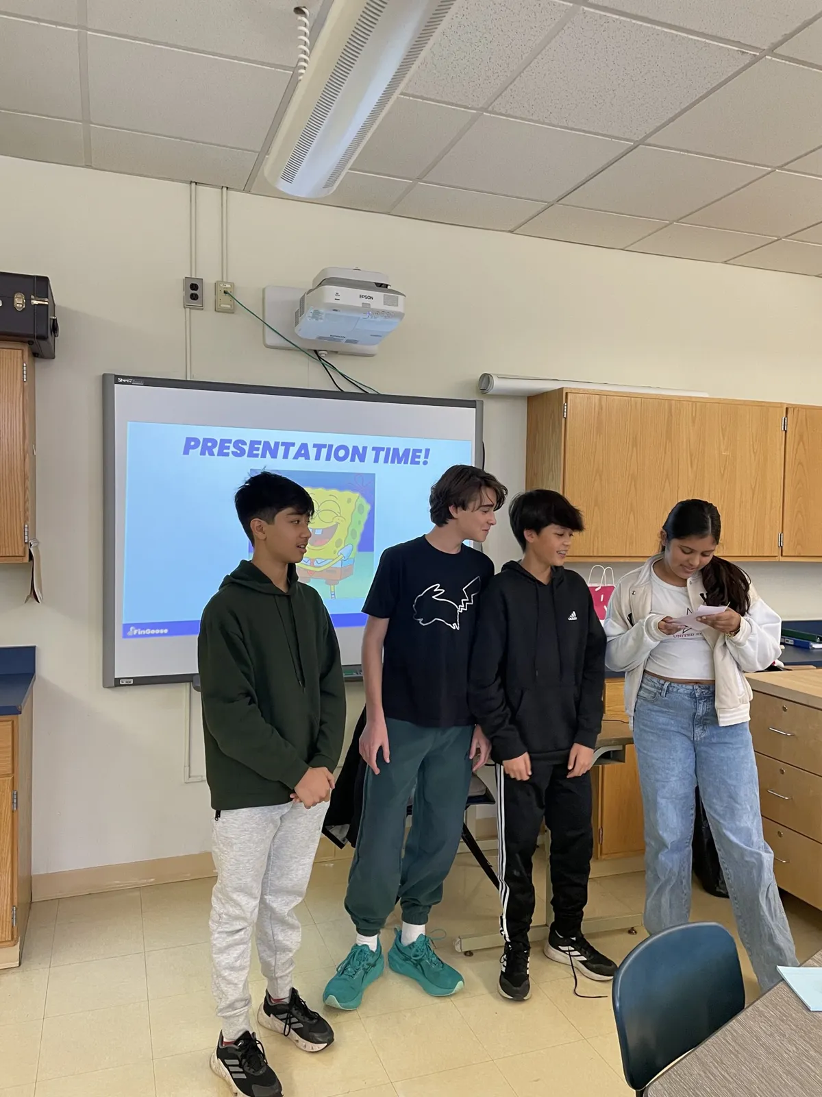 A student team presenting at Charles DeWolf