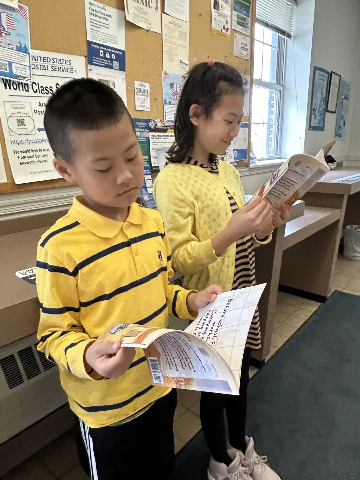 Students with donated FinGoose books